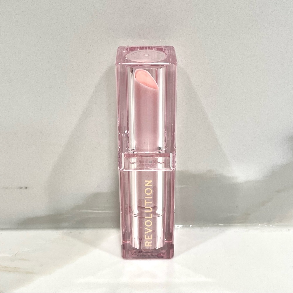 π 5/$25 NEW Revolution Mood Switch Aura Lip Balm (Kiss Pink)